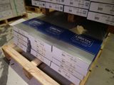 a stack of boxes sitting on a pallet in a warehouse