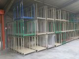 many shelves that are stacked up in a warehouse