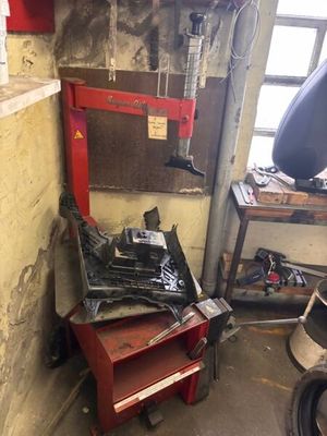 an image of a garage with a work bench and tools