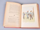 an open book with a picture of a group of people on it