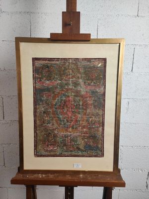 Tibet : Thangka représentant une divinité dans un halo, huil…