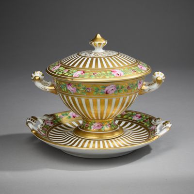 a close up of a bowl and saucer on a saucer