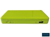 a green nintendo wii game console sitting on top of a white surface