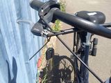 a close up of a bicycle parked on the side of the street