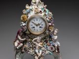 a small clock with a cheren and cheren cheren cheren cheren cheren cheren cheren cheren cheren cheren cheren