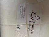 a bag of white toilet paper wrapped in plastic