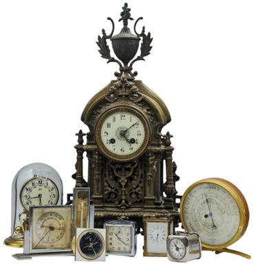 de nombreux types d'horloges présentés sur un fond blanc