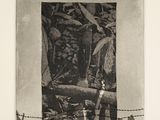 black and white photograph of a vase on a table next to a fence