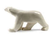 a white polar bear figurine on a white background