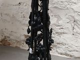 a lamp that has a bird on it on a stand