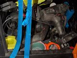 a picture of a cluttered garage with tools and tools
