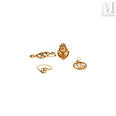 three gold - plated rings and a ring on a white background