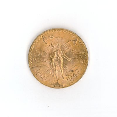une image d'une pièce d'or sur une surface blanche