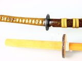 a close up of a knife and a blade on a white surface