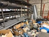 a large pile of assorted items in a warehouse