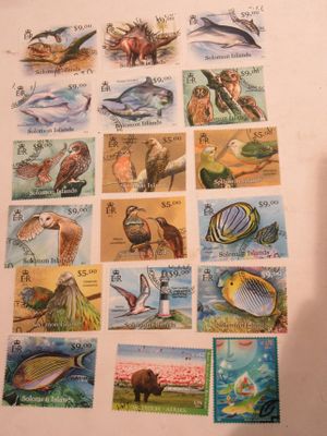 a picture of a collection of stamps with animals on them
