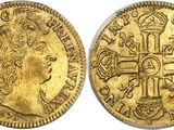 a gold coin with a cross on the front and a crown on the back