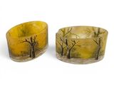 two bowls that are sitting next to each other