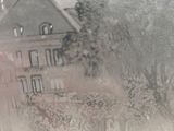 a view of a house through the window of a car