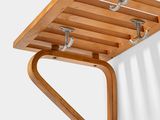 a wooden shelf with hooks and hooks attached to it