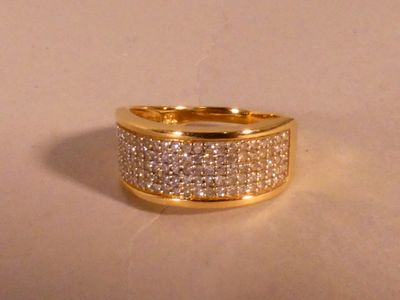 an image of a diamond ring on a white surface