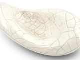 an image of a white bowl on a white surface