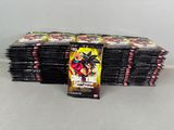 a pile of dragon ball cards sitting on top of each other