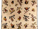 un vieux tapis navajo orné de motifs géométriques sur fond blanc