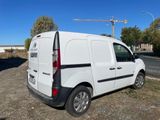a white van parked on the side of the road