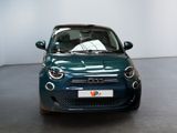 a small car that is parked in a room