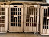 four crates that are sitting on the floor