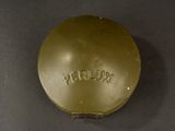 a gold plate with the word perilox written on it