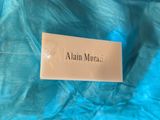 a close up of a name tag on a blue cloth