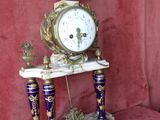 a clock that is sitting on top of a table