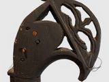 a close up of an old cane with a decorative design on it