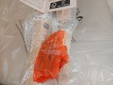 a teddy bear that is wrapped up in plastic