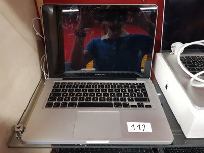 a laptop computer that is sitting on a table