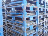 a large pile of pallets sitting on the ground