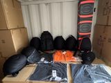 many bags of luggage sitting in the back of a truck