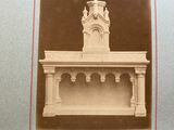an old photo of a clock tower in the middle of a picture