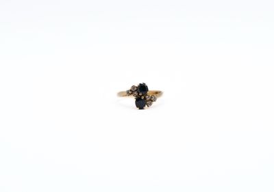 an image of a black diamond ring on a white background