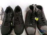several pairs of shoes are lined up next to each other