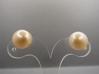Paire de boutons d'oreilles en argent 925/1000 ornée de perl…