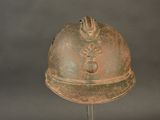a helmet that is sitting on a stand on a table