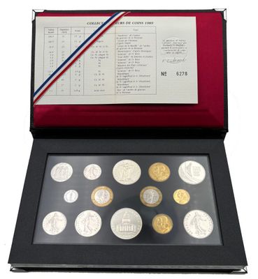 an image of a set of five coins in a box
