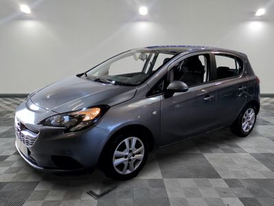 a picture of a small car parked in a garage