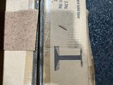 a box with a piece of paper on top of it