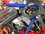 many different tools in a blue box together