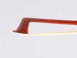 the bow is made of wood and has a wooden handle