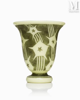 a green vase with stars and stripes on it
